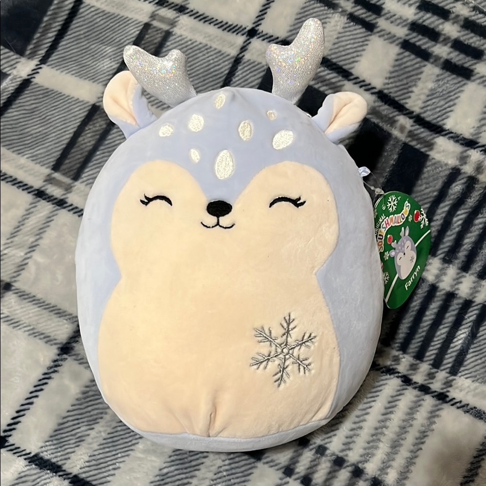 Farryn with snowflake Squishmallow